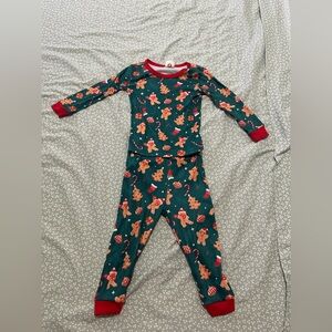 Festive Green Kids Pajamas with Gingerbread Print